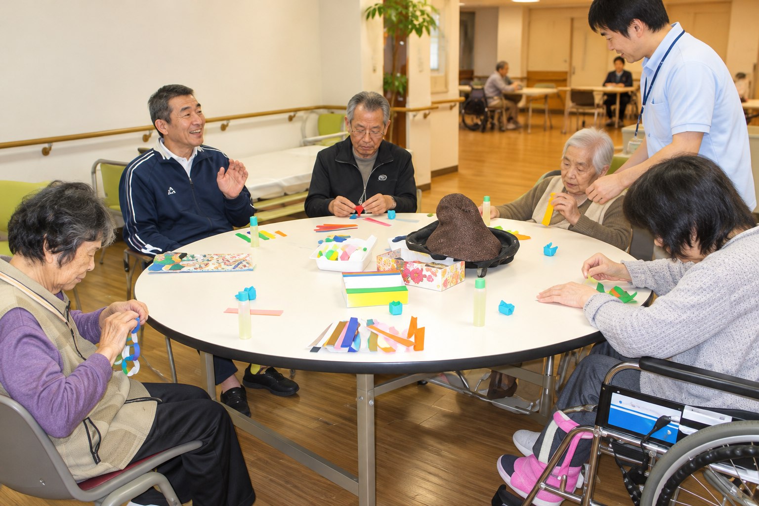 机を囲んで活動する利用者様