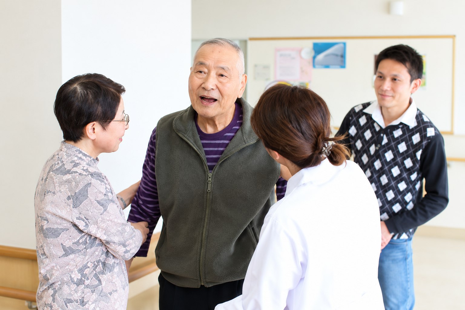 患者様をご家族とスタッフが支援する様子